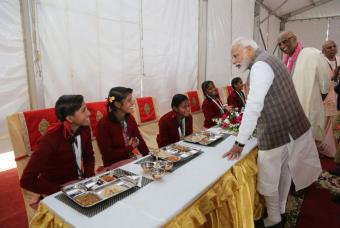 Taking a moment to interact with the children