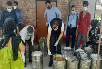 Volunteers help with the service